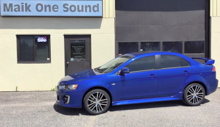 Blue 2017 Mitsubishi Lancer with premium window tint